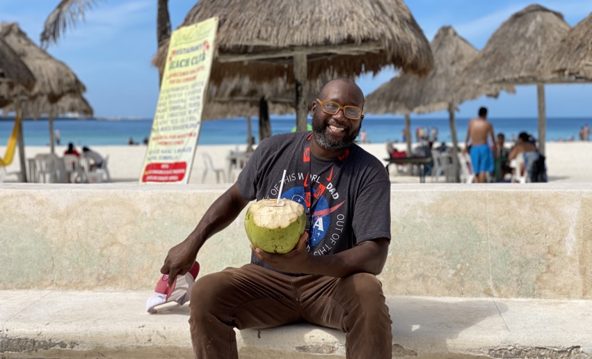 Sipping on coconut water in Progreso beach - outside of Merida Mexico